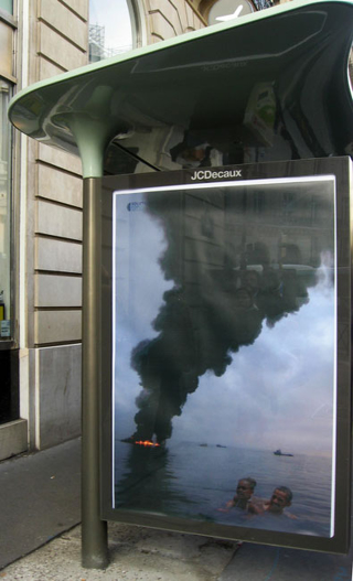 Illustration for article titled Paris Is Covered In Fake Ads That Mock the Climate Talks' Corporate Sponsors